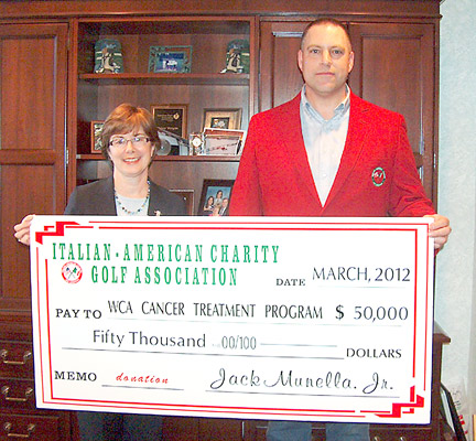 Jack Munella Jr., chairman of the Italian-American Charity Golf Association, presents a check in the amount of $50,000 to Betsy T. Wright, WCA Hospital president/CEO, representing the proceeds from 2011 Italian-American Charity Golf Tournament and the second installment of a three-year, $150,000 pledge for the purchase of Electromagnetic Navigation Bronchoscopy to aid in the diagnosis and treatment of lung cancer at WCA.