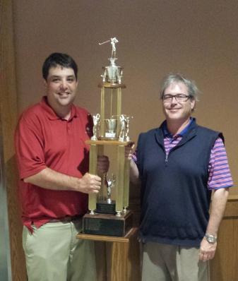 Peter Morgante and Jon Gren Jr. are pictured with the trophy after winning the Italian-American Charity Golf Tournament on Saturday. Submitted photo
