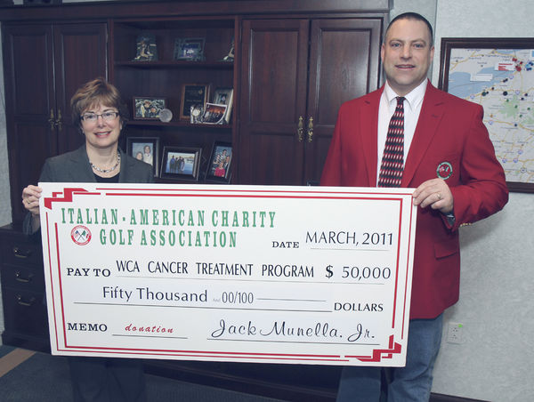 Jack Munella Jr., Italian American Charity Golf Association chairman, is pictured presenting a $50,000 check to Betsy T. Wright, WCA Hospital president and chief executive officer, representing the proceeds from the 2010 Italian American tournament. It is first installment of a three-year, $150,000 pledge for the purchase of electromagnetic navigation bronchoscopy to aid in the diagnosis and treatment of lung cancer.